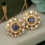 Load image into Gallery viewer, A pair of silver earrings with gold polki design and blue stones.