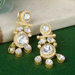 Load image into Gallery viewer, A pair of silver earrings with multiple dangling crystals, placed on a flat surface.