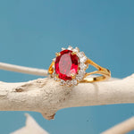 Load image into Gallery viewer, Gold Plated Oval Cut Ruby Red Stone Ring with American Diamond Halo Design