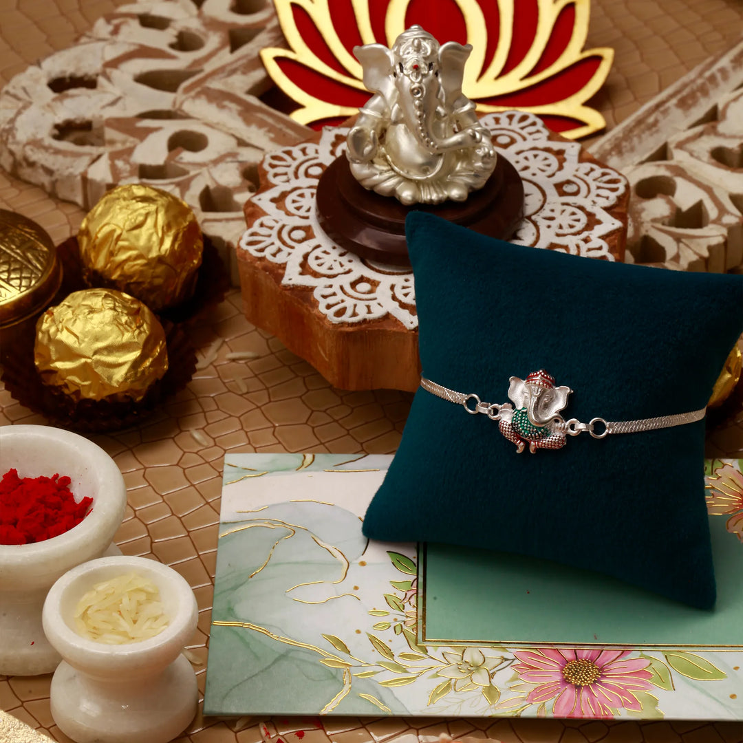 🎁 Silver Coated The Guardian Ganpati Rakhi (100% off)