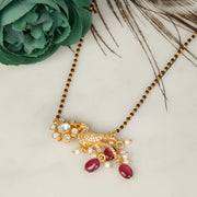 The Midnight Blossom Pendant.