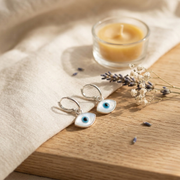 DRK Jewels 925 Silver Evil Eye Hoop Earrings for Women Minimal Huggie Design