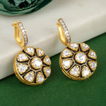 Load image into Gallery viewer, A pair of silver earrings with gold accents and black enamel detailing, featuring a floral pattern with polki stones.