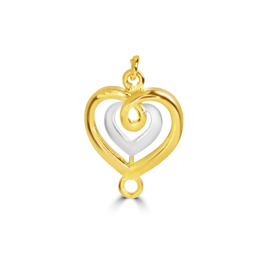 Gold and silver heart-shaped pendant 