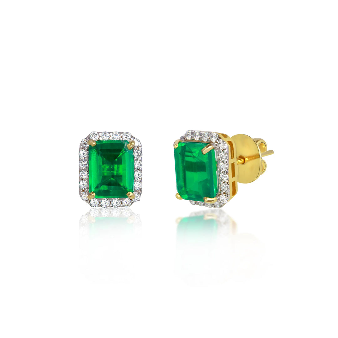 Gold earrings with green gemstones 