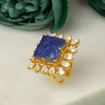 Load image into Gallery viewer, Gold plated silver ring with a blue gemstone and diamond accents on a light background
