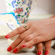 Side View of Designer Gold Heart Ring with Green Stone Setting