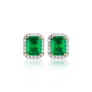 Pair of emerald green gemstone earrings with gold accents