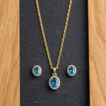 Load image into Gallery viewer, 9KT Gold Blue Topaz Halo Pendant Necklace &amp; Stud Earrings Set