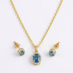 Load image into Gallery viewer, 9KT Gold Blue Topaz Halo Pendant Necklace &amp; Stud Earrings Set