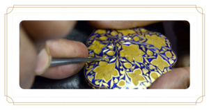 Floral pattern being engraved on the pendant